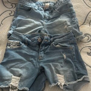 Two pair justice jean shorts. Size 10